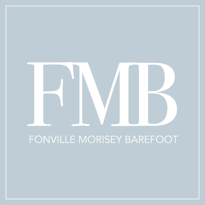 Fonville Morisey Barefoot Logo Fonville Morisey Barefoot Logo - Serif white type over white sans-serif type on blue background