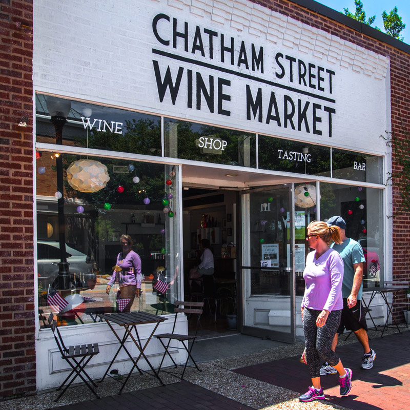 People walking past Chatham Street Wine Market